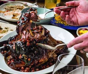 The Zahav Lamb Shoulder Recipe by Michael Solomonov Rosh Hashanah Menu, Jewish Foods, Creamy Peas, Andrew Zimmern, Persian Cuisine, Jewish Food, Dry Chickpeas, Lamb Shoulder, Pomegranate Molasses