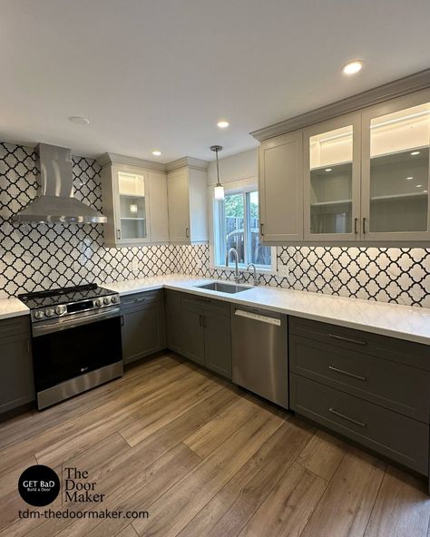 Shaken, not stirred... This stunning kitchen makeover by Felm Homes features our Vermont Shaker cabinet door with a clean 7 edge profile. The rich dual-toned cabinetry magnifies the space, with the White Smoke Super Matte finish on the uppers and Gauntlet Grey on the lower cabinets. Let TDM help you build custom cabinet doors for your next home or office project. Choose from our collection of over 30 door panel designs, 10 edge profiles, and over 130 colors and finishes to Build a Door and ... Gauntlet Grey, Build A Door, Gauntlet Gray, Lower Cabinets, Custom Cabinet Doors, Building A Door, Shaken Not Stirred, Custom Cabinet, Edge Profile