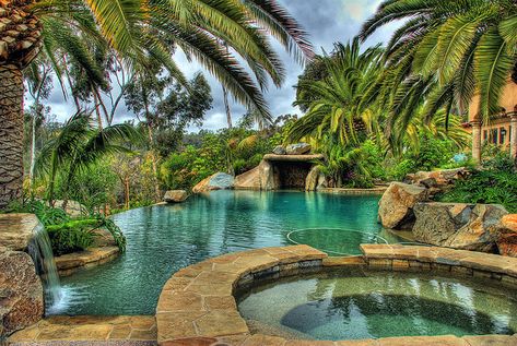 Dream Pool...  And if I could go all out... I'd make that cave into a lazy river/moat that goes all the way around my house.  Whole thing equipt with sea turtles. Duh Lagoon Pool, Tropical Backyard, Lazy River, Tropical Pool, Natural Swimming Pools, Luxury Pools, Dream Pools, Landscape Designs, Beautiful Pools