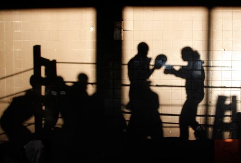 The shadows of amateur boxers is seen on the wall as they train in the early morning light at the Hillbrow Boxing Gym, Johannesburg, South Africa, 11 July 2012.   kim ludbrook Sparing Boxing Aesthetic, Boxing Ring Aesthetic, Boxing Gym Aesthetic, Shadow Lighting, Boxer Aesthetic, Shadow Boxing, Johannesburg South Africa, Johannesburg South, Boxing Gym