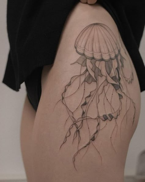 Discover the art of transformation with jellyfish tattoos in our article. Explore it and find 50+ stylish designs with meanings explained. Jellyfish Tattoo Design, Cute Thigh Tattoos, Jellyfish Tattoo, Hip Tattoos Women, Stylist Tattoos, Thigh Tattoos Women, Large Tattoos, Elegant Tattoos, Hip Tattoo