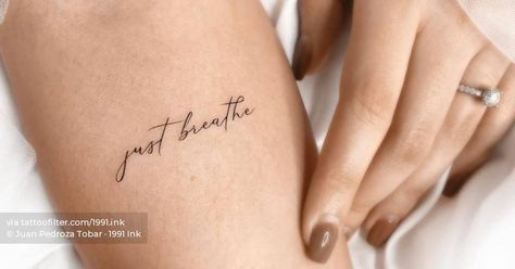 Women Script Tattoos, Inner Forearm Script Tattoo, Just Breathe Cursive Tattoo, Breathe Tattoos On Wrist, Just Breathe Quotes Tattoo, Just Breathe Tattoos For Women Forearm, Tattoos For Women Bicep, Breathe Tattoos For Women Small, Calm Tattoo Ideas