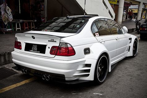 And Then Some… - You may need an oxygen mask when driving this super pumped up ride. Far out fenders? Check. Race car rear window gear? Check. Multiple muffler pipes? Double check.This one is all dressed up and ready to rumble. Bmw 118, E36 Sedan, Bmw E46 Sedan, E46 Touring, E46 Sedan, Bmw Touring, E46 Coupe, E36 M3, Custom Bmw