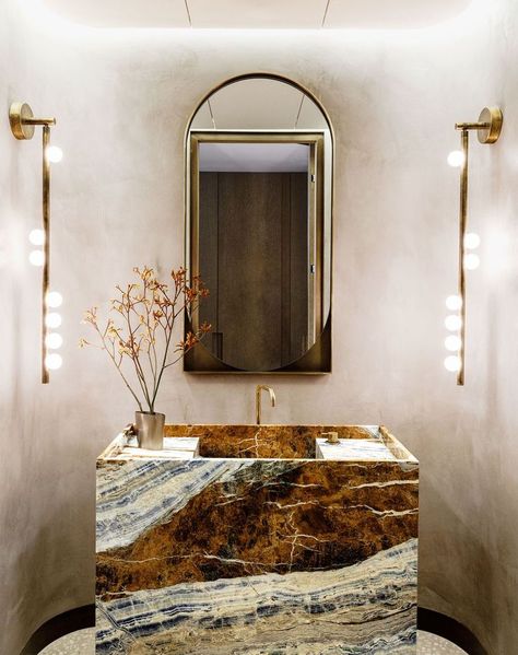 Mar 21, 2021 - If you think it's impossible to make a design statement in a small bathroom, think again. See how bold wallpaper, mirrors, and more﻿ can showcase the beauty of a small bathroom. Brass Tube, Powder Room Design, Brass Glass, Entry Foyer, Elle Decor, Glass Lighting, Bathroom Inspiration, 인테리어 디자인, Edison Light Bulbs