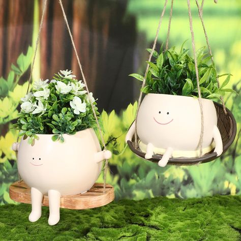 PRICES MAY VARY. Package Include: you will get 2 pack large size hanging swing planters in different styles, comes with S shaped hook and string, making it easier to hang anywhere in the house you want; Add a touch of fun and charm to any room or outdoor space with these eye catching hanging planters Reliable Material: these cute hanging swing planters are made of quality resin material, built to withstand both indoor and outdoor environments; No need to worry about cracking or fading due to sun Hanging Garden Indoor, Cute Outdoor Decor, Hanging Planter Boxes, Unique Planters, Chair Planter, Plant Store, Outdoor Home Decor, Unique Planter, Outdoor Pots