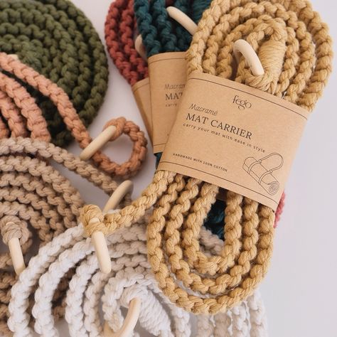 From yoga mats to picnic blankets, or even your camera stand – our hand-knotted macrame strap is the stylish, all-purpose carrier you didn’t know you needed! Make it uniquely yours or a thoughtful gift – personalize with a leather name deboss tag. #fegome #matcarrier #macrameyogastrap #macramé #customisegifts #yogakl Yoga Strap Macrame, Macrame Camera Strap, Macrame Strap, Camera Stand, Yoga Strap, Craft Products, Picnic Blankets, Fibre Art, Camera Strap