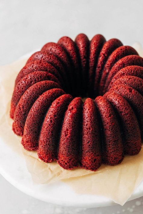 This moist red velvet bundt cake is rich and so flavorful. It has that signature mild chocolate flavor, tender texture, and deep red velvet color. All topped off with a silky cream cheese icing! #redvelvet #bundtcake #creamcheese #butternutbakery | butternutbakeryblog.com Cakes Red Velvet, Red Velvet Cake Recipe Easy, Red Velvet Bundt, Mini Bundt Cakes Recipes, Red Velvet Bundt Cake, Cake Brownie, Red Velvet Recipes, Nothing Bundt, Red Velvet Cake Recipe