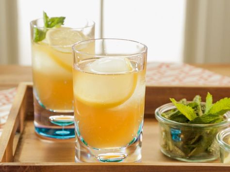 Trisha's Porch Punch recipe from Trisha Yearwood via Food Network Porch Punch, Trisha's Southern Kitchen, Trisha Yearwood Recipes, Desert Drinks, Mint Simple Syrup, Trisha Yearwood, Southern Kitchen, Southern Kitchens, Punch Recipe