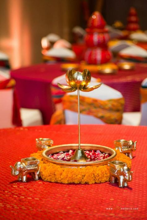 Mehndi centerpieces with brass lotus and elephants.  #Wedding #3production Weddings#Centerpiece Indian Decoration, Bridal Photos, Decoration Table, Jewelry Designs, Table Centerpieces, Table Setting, Lehenga, Table Settings, Decor Ideas