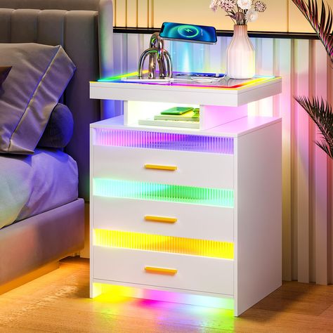 PRICES MAY VARY. 【RGB Glass Top Panel with lights】The nightstand has RGB 7 dynamic lighting modes and Auto sensor light, with two switching modes for touch screen and remote control. It can be changed according to different scenarios. Open the human body sensor button, when you are close to 1-2 meters, the LED light will automatically light up. Make your life full of surprises and rituals. Also perfect for parties, anniversaries, Christmas and other festive atmosphere 【 Wireless Charging Station Acrylic Bedside Table, Led Nightstand, Side Tables For Bedroom, Wireless Charging Station, 3 Drawer Nightstand, Amazon Favorites, Teen Bedroom Furniture, White Bedroom Furniture, White Nightstand