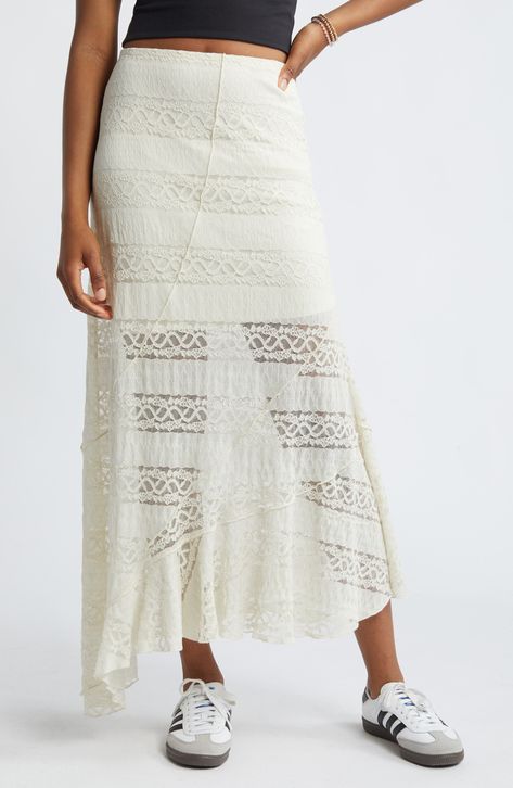 An asymmetric hem creates the flowy silhouette of this airy lace midi skirt. 40 1/2" length (size medium) Pull-on style Lined 99% polyester, 1% spandex Machine wash, tumble dry Imported Not available for sale and shipment to Germany Gonna Midi, Skirt Images, White Lace Skirt, Lace Midi Skirt, Skirt White, Asymmetrical Skirt, Lace Midi, Bridal Lingerie, Women Maxi