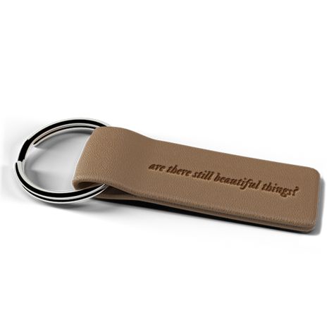 Folklore/Merchandise/the "are there still beautiful things?" keychain | Taylor Swift Wiki | Fandom Faux Leather Keychain, Taylor Swift Merchandise, Song Lyric, Music Accessories, Accessories Phone, Leather Keychain, How To Get Rich, The Song, Be Still