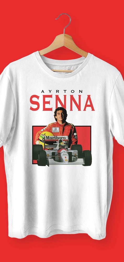 Revive the racing legend with the Ayrton Senna F1 T-Shirt, a tribute to the iconic Formula 1 champion. This meticulously designed tee captures Senna's unparalleled skills on the track. Crafted with premium materials, the Ayrton Senna F1 T-Shirt offers comfort and style. A must-have for fans and collectors, it's the perfect addition to your racing-inspired wardrobe. Stand out and honor the legacy of Ayrton Senna with this timeless piece. #AyrtonSenna #F1 #FormulaOne #RacingChampion #TShirt F1 Tshirt Ideas, F1 Tshirt Designs, F1 Shirt Design, F1 T Shirt, Senna F1, Motorsport Clothing, F1 Wag, Wardrobe Stand, Gilles Villeneuve