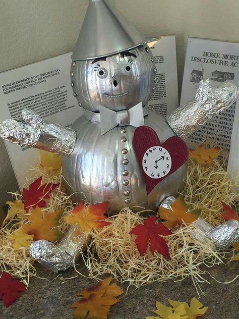 Tin man pumpkin Tin Man Pumpkin Decorating, Tin Man Pumpkin Ideas, Wizard Of Oz Pumpkin Ideas, Pumpkin Hammering, Tin Man Pumpkin, Wizard Of Oz Pumpkin, Pumpkins Decorating, Halloween Candy Crafts, Pumpkin People