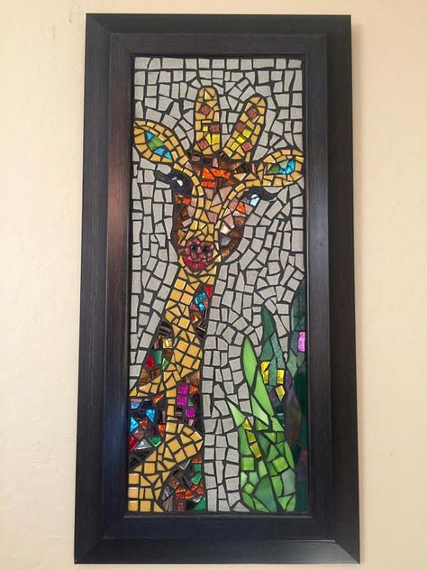 This unique piece is made with glass tiles, reflective mirror tile, and glitter tile. The background is unglazed porcelain. This beautiful giraffe would be the perfect compliment to any wall. ● 12wide by 24high ● Dark brown frame ● Entire piece is grouted with charcoal sanded Mosaic Giraffe, Glitter Tile, Glitter Tiles, Tile Artwork, Mirror Tile, Mosaic Animals, Mosaic Frame, Mosaic Murals, Unglazed Porcelain