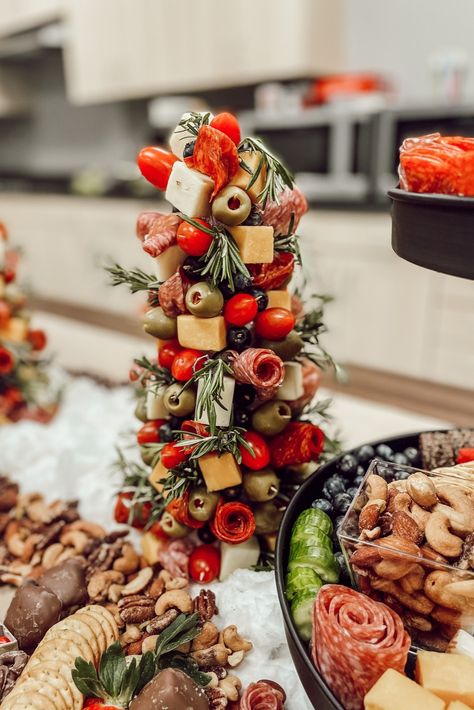 Under the Tree: The Gift of Charcuterie Christmas Trees | Ozark Charcuterie | Embrace the season of giving with the gift of a Charcuterie Christmas Tree! Capture the joy of the holidays with delightful charcuterie boards and graze tables. Spread the cheer with your loved ones by crafting Charcuterie Trees this Christmas! #charcuterie #charcuterieboard #grazetable #charcuteriecup #smallbusiness #christmascharcuterie #christmas Charcuterie Table Christmas, Charcuterie Christmas Tree Cone, Christmas Tree Charcuterie Tower, Charcuterie Trees, Charcuterie Board Tree, Christmas Charcuterie Table, Charcuterie Christmas Tree, Hosting Meals, Charcuterie Tables