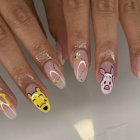 Winnie the Pooh set for her Disney trip!!! Didn’t breathe for 3 hours by so worth it😍🐝 #nails #nailtech #disney #disneynails #nailart #characterart #gelx #gelxnails #nailsofinstagram #nailsnailsnails #naildesign #nailporn #nailinspo #vancouver #trend Piglet Nail Art, Piglet Nails, Eeyore Nails, Disney Character Nails, Winnie The Pooh Nails, Animation Nails, It Nails, Disney Nail, Almond Acrylic Nails