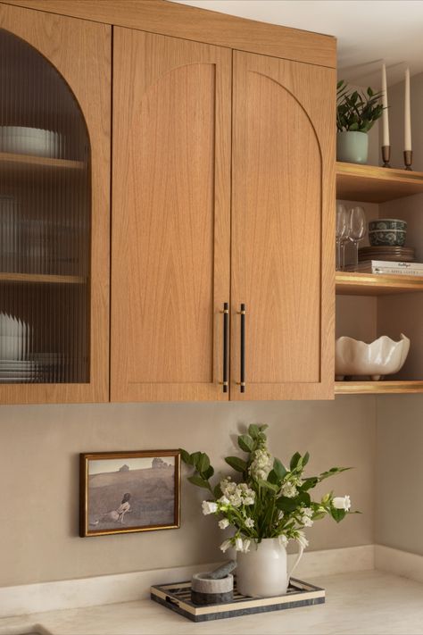 Our clients hired us to transform their kitchen into a warm, organic, and functional space. Designed for a professional chef, the kitchen now features custom arched cabinets with ribbed glass and brass inlay, honoring its 1922 Art Deco roots. The water-resistant lime wash backsplash adds texture and warmth, while the honed marble countertop grounds the design. Every inch of storage was maximized, including an appliance garage and a full pantry Arched Cabinets, Full Pantry, Lime Wash, Appliance Garage, Brass Inlay, Park Slope, Honed Marble, Marble Countertop, Functional Space