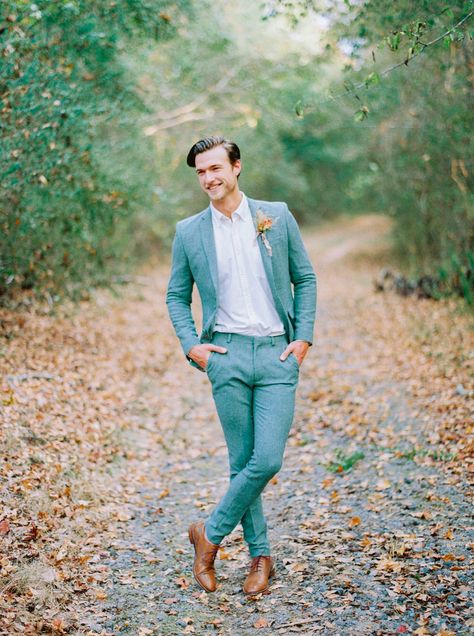 groom in turquoise suit Orange And Green Wedding Groomsmen, Turquoise Groom Suit, Teal And Rust Wedding Groomsmen, Fall Wedding Suits For Men Burnt Orange, Dark Teal And Rust Orange Wedding Groomsmen, Teal And Burnt Orange Wedding Groomsmen, Bachelorette Powerpoint, Fall Micro Wedding, Green Tux