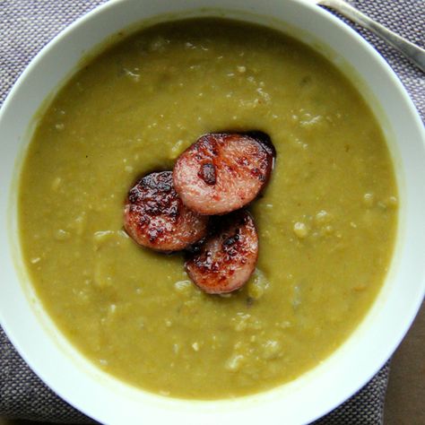 Using kielbasa instead of the more common ham hock is an easy alternative to add smokiness to this split pea soup. Vegan Split Pea Soup, Pea Soup Recipe, Warm Soup Recipes, Split Pea Soup Recipe, Ina Garten Recipes, Lamb Meatballs, Ham Soup, Split Pea Soup, Sausage Soup