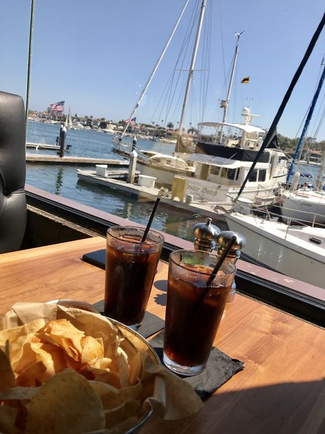 Dinner at Tony Hawk restaurant in Newport Beach Boat Dinner Aesthetic, Beach Dinner Aesthetic, Yacht Dinner Aesthetic, Aesthetic Beach Restaurant, Miami Beach Aesthetic Food, Beach View Restaurant, Dinner Aesthetic, Beach Dinner, Tony Hawk