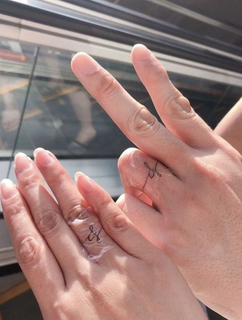 Wedding Tattoo Initials, Tattoo Ring Finger Initials, Ring Finger Marriage Tattoo, Fine Line Wedding Band Tattoo, Tattoos For Wedding Finger, Initial On Wedding Finger, Spouse Finger Tattoo, Tattoo Wedding Rings Initials, Women Ring Finger Tattoo