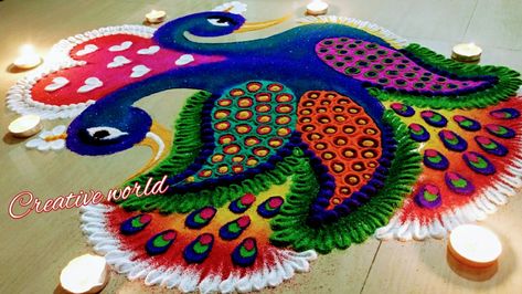 By Creative world Beautiful peacock Rangoli Watch full video 👇https://youtu.be/NiHhbLRviow 👇 subscribe now 🙏 Rangoli Designs Creative, Cartoons Rangoli Design, Peacock Rangoli Design, Rangoli Photos, Rangoli For Diwali, Rangoli Designs For Competition, Peacock Rangoli, Rangoli Designs Photos, Rangoli Designs Simple Diwali