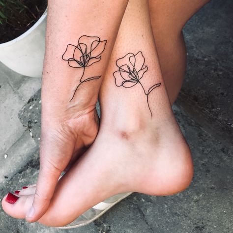 Poppy flower minimalist tattoo #motherdaughtertattoos #tattoos #tattooideas Different Mother Daughter Tattoos, 3 Daughter Tattoos For Mom, Mom And Daughter Tattoos Simple, Mother Daughter Son Tattoos Matching, Small Mom And Daughter Tattoos Unique, Flower Mother Daughter Tattoo, Simple Mom And Daughter Tattoos, Mom And Daughter Flower Tattoos, Step Mom And Daughter Tattoos