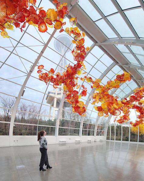 This colorful oasis is truly my favorite place in Seattle 🌈✨ Chihuly Garden and Glass is no ordinary art museum - each piece is a stunning testament to Dale Chihuly's unparalleled creativity. 🎨 From the mesmerizing baskets and scenic sculptures to the enchanting gardens, every corner will surprise and delight. #seattlelove #wishyouwerenorthwest #bestofseattle #travelwashington #explorewashington #travelseattle #handblownglass Seattle Glass Museum, Chihuly Garden And Glass Seattle, Chihuly Garden, Vacation Locations, Dale Chihuly, Glass Museum, Chihuly, Summer Travel, Travel Poster