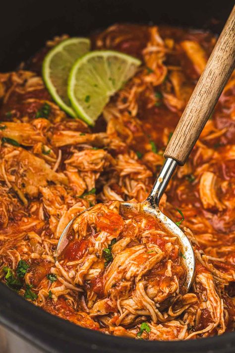 The finished and shredded salsa chicken being stirred inside slow cooker. Shredded Salsa Chicken, Spicy Shredded Chicken, Three Esta, Salsa Chicken Crockpot, Slow Cooker Salsa Chicken, Slow Cooker Salsa, Slow Cooker Shredded Chicken, Chicken Crockpot, Salsa Chicken