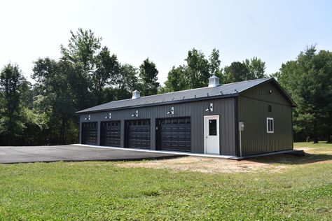 This is a 4-car garage that we built in Midlothian, VA. Click the link for the full list of specs! 5 Car Garage Detached, 4 Car Garage Plans With Loft, 3 Car Garage Metal Building, 4 Bay Shop, 4 Car Garage Plans, Black And White Pole Barn, Big Garage Ideas, 4 Stall Garage, Large Garage Ideas