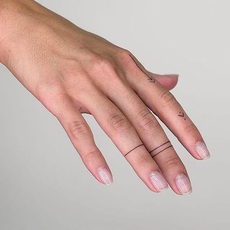 Simple line tattoos on right hand’s fingers Line Around Finger Tattoo, Mini Finger Tattoos Simple, Hand Line Tattoos For Women, Dot And Line Finger Tattoo, Lines On Finger Tattoo, Finger Lines Tattoo, Line Tattoos On Fingers, Simple Line Hand Tattoo, Finger Line Tattoos For Women