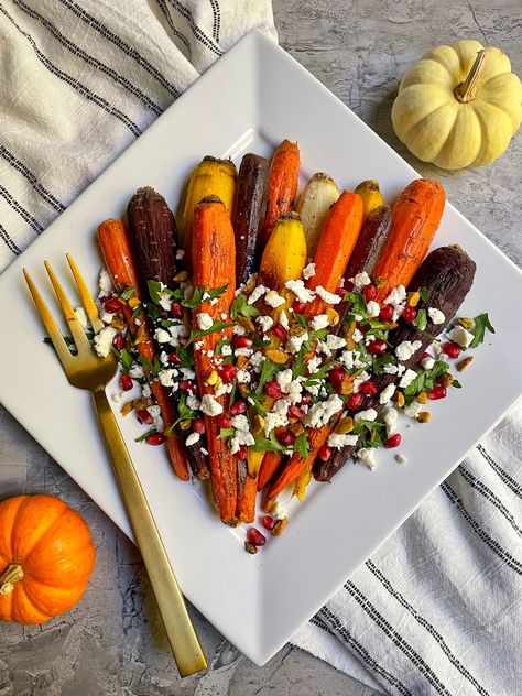 Say goodbye to boring roasted carrots and hello to big flavor with these honey roasted carrots with goat cheese, pistachios and pomegranate arils. Roasted Carrots With Goat Cheese, Carrots With Goat Cheese, Spicy Honey Butter, Baked Carrots Recipe, Honey Butter Glaze, Pumpkin Cream Cheese Bars, Vegan Chickpea Curry, Honey Roasted Carrots, Butter Glaze