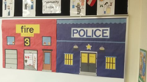 Fire and Police Stations on the white board to set background for Community Helpers unit. Fire Station Bulletin Board, Town Themed Classroom, Community Helpers Classroom Decor, Police Station Background, Community Helpers Police, Preschool November, Prek Themes, Community Helpers Preschool Crafts, Community Helpers Crafts