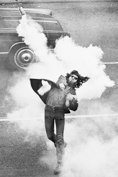 5 May 1970: A man at the University of California, Berkeley, throws a tear gas canister at police during a student strike to protest against the killing of four students at Kent State University. The Berkeley demonstration was one of many across the nation in direct response to the killings by National Guardsmen during an anti-Vietnam War demonstration the previous day Poster Images, Tear Gas, By Any Means Necessary, Ansel Adams, Mike Tyson, Alberta Canada, Photojournalism, American History, Amazing Photography