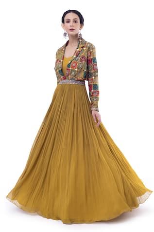 Mustard yellow sleeveless georgette gown pleated waist down with embellishments accentuating the waistline. Paired with a full sleeve mirror, cutdana and sequin embellished multicolour silk crop jacket. - Aza Fashions Indian Gowns Dresses With Jacket, Yellow Dress For Haldi Function, Dress For Haldi Function, Collar Gown, Mustard Yellow Outfit, Yellow Mirror, Silk Saree Blouse Designs Patterns, Gown With Jacket, Draped Gown