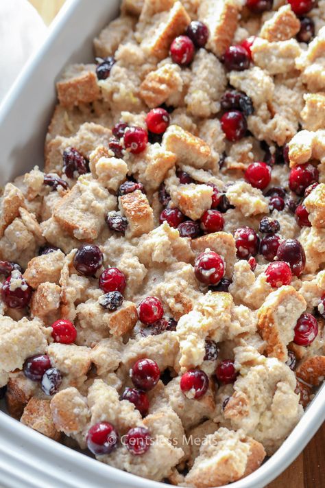 This easy bread pudding recipe is one of our favorite desserts during the holidays. I love the addition of cranberries and the homemade vanilla sauce! #centslessmeals #cranberry #cranberrybreadpudding #breadpudding #christmascake #christmaspudding Traditional Bread Pudding Recipe, Almond Bread Pudding, Easy Bread Pudding Recipe, Cranberry Bread Pudding, Easy Bread Pudding, Traditional Bread Pudding, Bread Pudding Easy, Cranberry Dessert, Cranberry Orange Bread