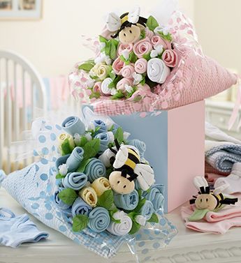 Baby Sock Flower Bouquets wrapped in baby clothes or muslin wraps so double the gift Baby Socks Flowers, Baby Socks Roses, Diy Baby Socks, Maternity Gifts, Baby Sock Bouquet, طفلة حديثة الولادة, Baby Bouquet, Nappy Cakes, Cadeau Baby Shower