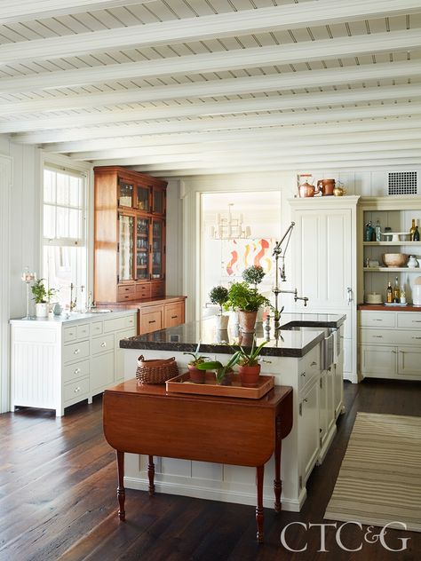 The inspiration for this newly constructed coastal Connecticut home came from its location in a historic harborside village. Beautiful shades of blue and neutral colors decorate the interiors. - Photograph by Tim Lenz #cottages #farmhousestyle #countryliving #homeinspo #kitchendesign #kitcheninspo Breezy Kitchen, Coastal Connecticut, Beach House Decor Coastal Style, Cape Cod Cottage, Cabin Kitchen, White Ceramic Tiles, Beach Bungalow, Beach House Kitchens, Beach Shack