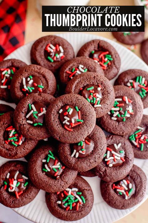 Soft chocolate cookies with creamy chocolate ganache in the center topped with sprinkles or candy bits. This sweet version of classic thumbprint cookies is a chocolate lovers dream perfect any time of the year. Soft Chocolate Cookies, Soft Chocolate Cookie, Chocolate Thumbprint Cookies, Fudge Pie, Christmas Cookie Recipe, Buttery Shortbread Cookies, Thumbprint Cookies, Chocolate Filling, Creamy Chocolate