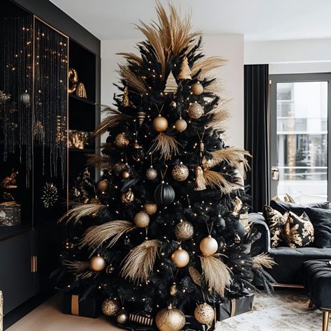 A gold and black Christmas tree with feathers exudes style. Add drama to your holiday decor with this design. Elegant Black Christmas Tree, Feathers On Christmas Tree, Black And Gold Christmas Decorations, Black And Gold Christmas Tree Ideas, Black And Brown Christmas Tree, Safari Christmas Tree, Christmas Tree With Feathers, Black Xmas Tree Decorating Ideas, Gold And Black Christmas Tree