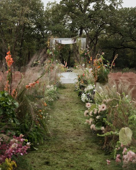 Florist Spotlight ✨ @idamayesfloral created whimsical florals than transported us all out of Austin for Shelly & Daniel's wedding ceremony and reception. The draping greenery and wild spontaneous florals brought the mood for this event and were floored by their installations! 

florals: @idamayersfloral Meadow Flowers Wedding, Wildflower Installation, Ground Meadow Wedding Ceremony, Ground Floral Installation Wedding, Meadow Installation, Maximalist Wedding, Whimsical Florals, Floral Meadow Installation, Cottagecore Wedding