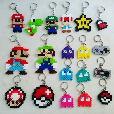 Perler keychains - mario, pacman, etc. Mini Hama Beads, Perler Bead Mario, Melty Bead Patterns, Easy Perler Beads Ideas, Art Perle, Hama Beads Design, Diy Perler Bead Crafts, Perler Crafts, Motifs Perler