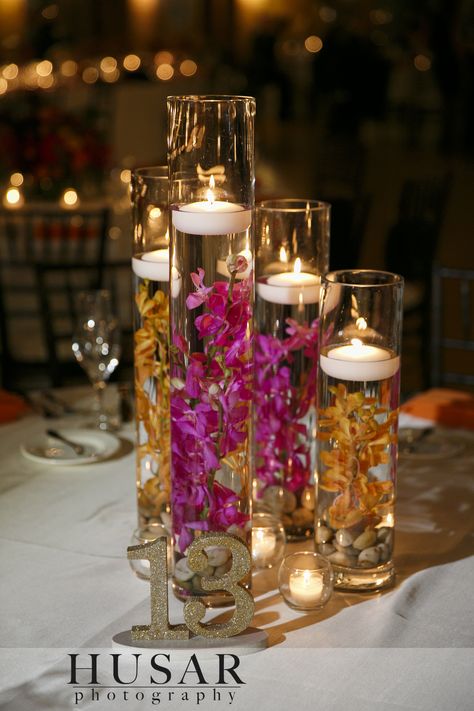 Wedding Centerpieces designed by Kloeckner Preferred Flowers Sunset Themed Centerpieces, Wedding Guest Centerpieces, Flowerless Centerpieces Wedding, Wedding Table Centrepiece Ideas, Lotus Flower Centerpiece, Flower Candle Centerpiece, Floating Flowers In Water, Wedding Table Centerpieces Candles, Flowerless Wedding Centerpieces