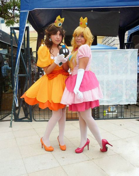 Womens Pair Halloween Costumes, Cosplay For 2 People, Peach And Daisy Cosplay, Peach And Rosalina Costume, Matching Halloween Costumes For Sisters, Daisy Halloween Costume Mario, Peach Daisy And Rosalina Costume, Peach And Daisy Halloween Costume, Matching Sister Costumes