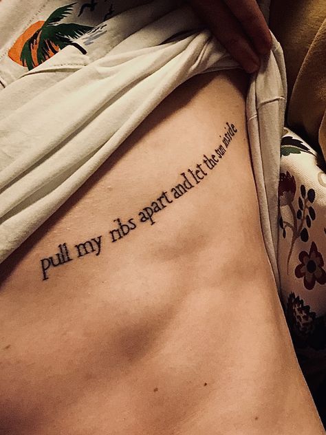 “Pull my ribs apart and let the sun inside” tattoo quote from Ribcage by Elbow Rib Cage Word Tattoos, Rib Tats For Women Quotes, Rib Cage Quote Tattoos, Side Tattoo Ideas For Women Rib Cage, Ribcage Tattoos For Women Quotes, Long Quote Tattoo Placement, Tattoo On Ribs For Women, Above The Knee Tattoo Quote, Ribcage Tattoos For Women