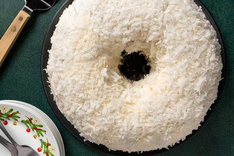 Copycat Tom Cruise Coconut Cake Recipe: How to Make It Copycat Tom Cruise White Chocolate Coconut Bundt Cake, Tom Cruise Christmas Cake, Tom Cruise White Chocolate Coconut Bundt Cake, Tom Cruz Coconut Cake, Coconut Cake Tom Cruise, Box Coconut Cake Recipe, Coconut Bundt Cake Recipes, Ina Garten Coconut Cake, White Chocolate Coconut Bundt Cake