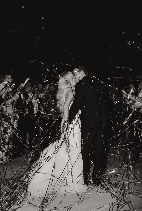 bride and groom leaving wedding with silver streamer exit Wedding Send Off Streamers, Silver Streamer Wedding Exit, Confetti Streamers Wedding, Streamer Send Off Wedding, Streamer Wedding Send Off, Streamers Wedding Send Off, Wedding Exit Streamers, Wedding Streamers Send Off, Streamer Exit Wedding