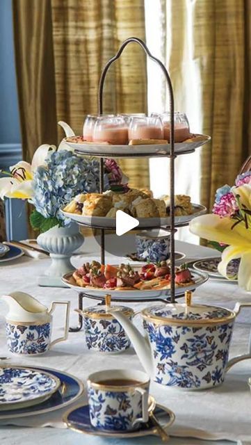 TeaTime Magazine on Instagram: "TeaTime has partnered with Victoria to present an elegant, English-inspired teatime that is sure to provide inspiration for your next afternoon tea affair. Set your table with regal gold flatware and simple white linens, paired beautifully with Wedgwood “Hibiscus” china, which features an intricate floral pattern in eye-catching blue-and-white with hints of gold details. A three-tiered stand brimming with savories, scones, and sweets creates an ideal focal piece to display a selection of scrumptious bites that are sure to delight. See the full tea by clicking the link in our bio or visiting https://teatimemagazine.com/english-elegance-tea/.

•

•

•

#teatime #afternoontea #teatimemagazine #recipes #victoriamagazine #tablesetting #teaparty #timefortea" Afternoon Tea Table Setting, Tea Table Setting, Tea Time Magazine, Tea Table Settings, Afternoon Tea Tables, Three Tier Stand, White Linens, Victoria Magazine, Gold Flatware