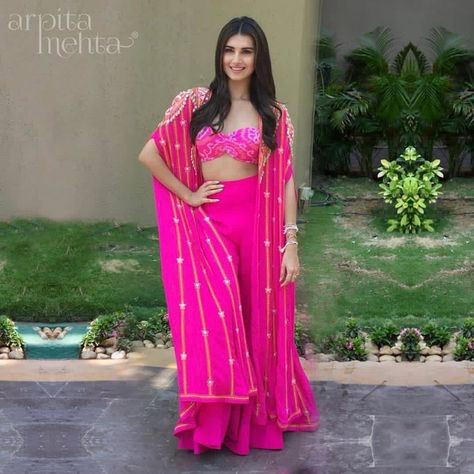 Pink crop top with flared pants and shrug  #mehndi #wedding #indianwedding #bride #bridal #pink #sharara #croptop #flared #pants #shrug #mehndioutfit  #shaadisaga #sangeet Crop Top With Pants, Arpita Mehta, Mehndi Outfit, Top With Pants, Mehendi Outfit, Mehndi Outfits, Tara Sutaria, Mehendi Outfits, Indian Dresses Traditional